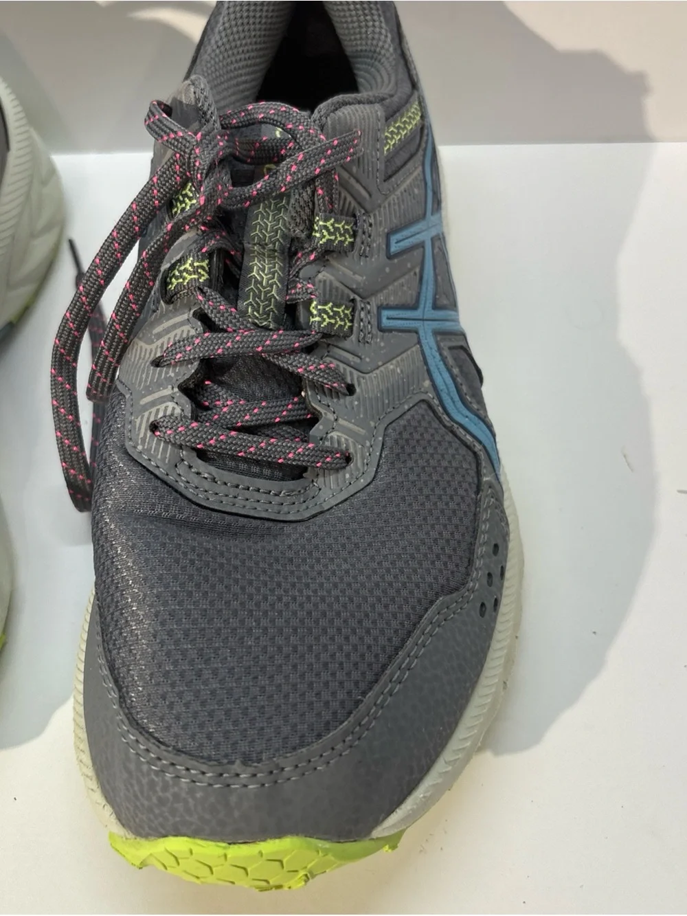ASICS woman Gray Running Shoe with Blue Logo and Neon Accents  size 9